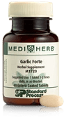 A bottle of MediHerb Garlic Forte herbal supplement.