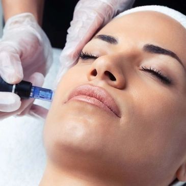Woman receiving a facial injection treatment.