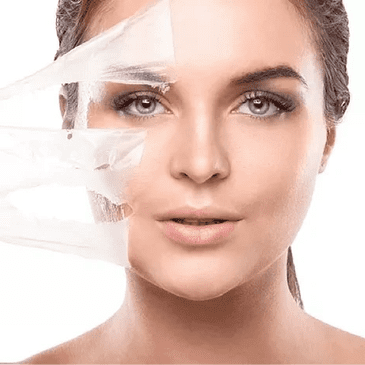 Close-up of a woman's face with clear skin and makeup.