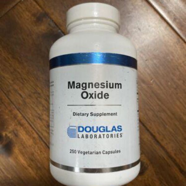 Bottle of Douglas Laboratories Magnesium Oxide dietary supplement.